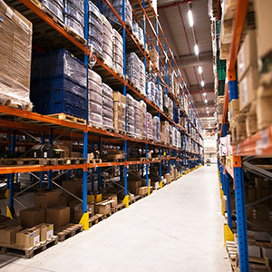 Warehouse storage shelving lined with boxes